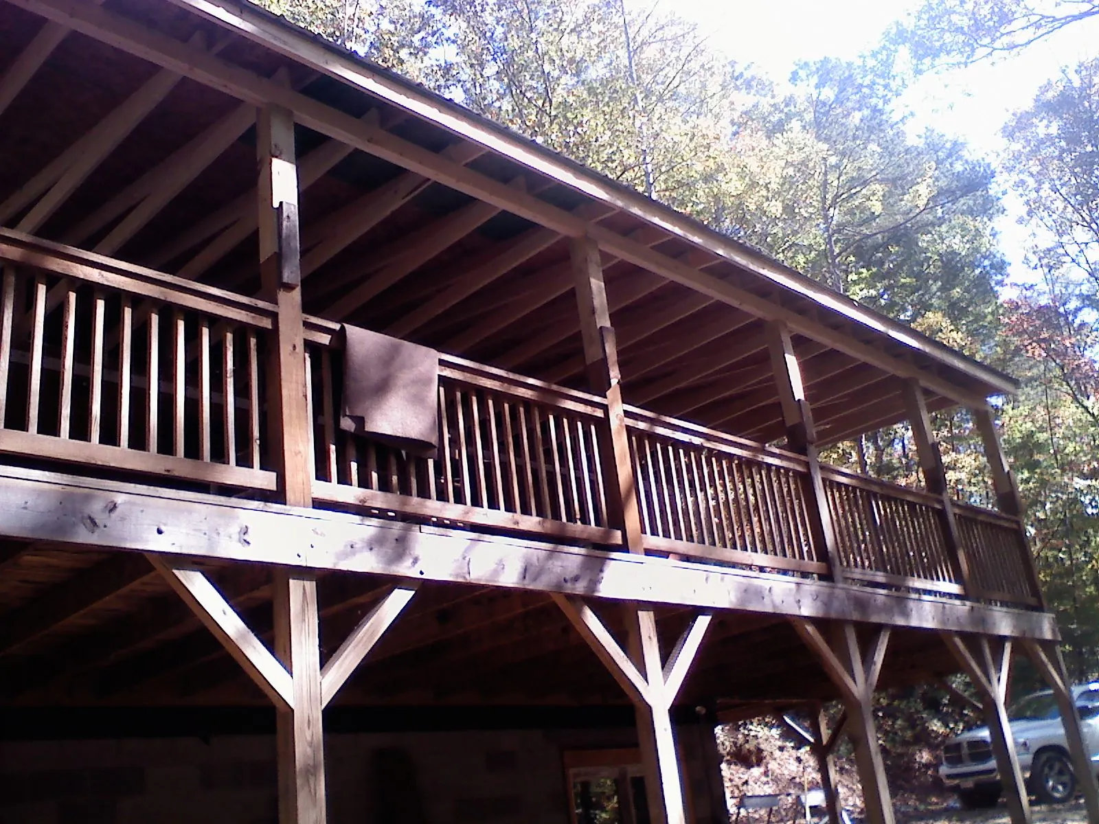 Timber framing under a new elevated porch and deck — Roof Leak Repair in Imlay City by Roofing Brothers